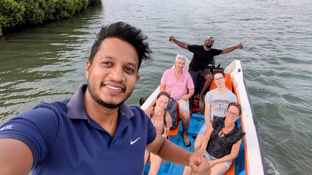Family enjoying a boat trip with their local guide in Sri Lanka