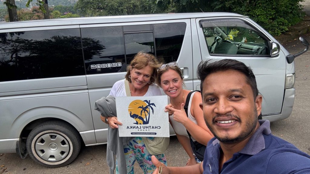 Travellers with their Chathu Lanka Tours driver-guide beside a private tour vehicle