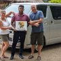 Guests with their private driver-guide and tour vehicle in Sri Lanka